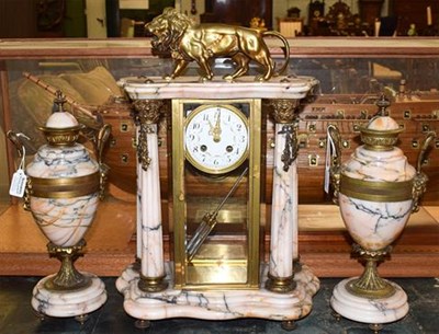 Lot 461 - A French marble portico four glass striking mantel clock with garniture, circa 1900