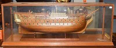 Lot 462 - A scale wooden model of HMS Victory, Trafalgar, 1805, in a table top glazed case, 108cm by 32cm...