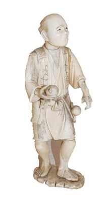 Lot 470 - A Japanese Meiji period ivory Okimono of a man holding gourds, 25cm