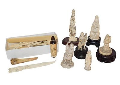 Lot 471 - A group of 19th century oriental and European ivory and bone items including carved figures,...