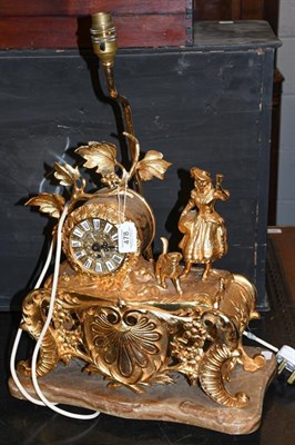 Lot 478 - A reproduction gilt metal mantel timepiece/table lamp