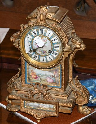 Lot 480 - A 19th century French ormolu and porcelain striking mantel clock - for restoration