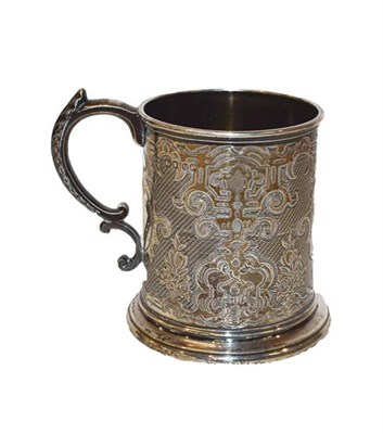 Lot 488 - A Victorian silver mug with chased foliate decoration, By Robert Hennell III, London 1852