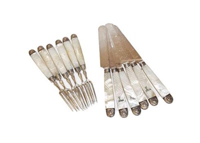 Lot 490 - A set of Victorian mother of pearl handled silver bladed dessert knives and forks, Sheffield, 1889