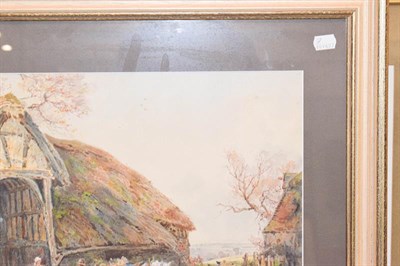Lot 1035 - Sydney Goodwin (1867-1944) Figures outside a tithe barn with a horse and cart, signed...