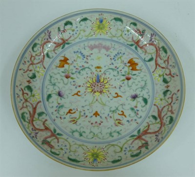 Lot 232 - A Chinese Porcelain Saucer Dish, Qianlong reign mark but probably later, painted in famille...