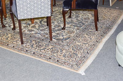 Lot 1081 - Nain Carpet, the ivory field with an all over design of scrolling vines and palmettes enclosed...