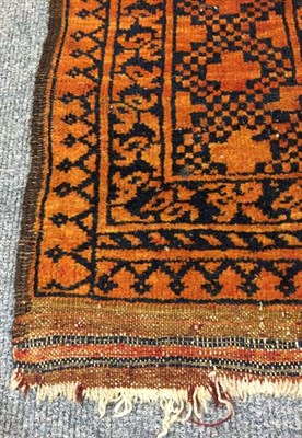 Lot 1088 - Afghan Ersari Carpet, the madder field with columns of 'elephant foot' guls enclosed by stellar...