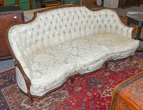 Lot 1093 - A George III style mahogany framed sofa, late 19th century, recovered in green buttoned fabric,...