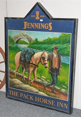 Lot 1127 - ~ A Jennings Brewery hanging painted pub sign ''The Pack Horse Inn'', 111cm by 147cm