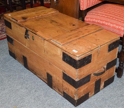 Lot 1128 - A pine blanket box with iron strap mounts and leather handles, 110cm by 50cm by 49cm
