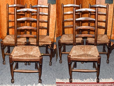 Lot 1133 - A set of six 19th century ladder back, rush seated country chairs