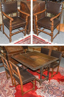 Lot 1135 - A 19th century oak gate leg table, together with a set of six oak studded leather chairs...