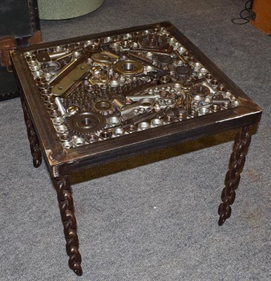 Lot 1143 - A Steampunk Industrial metal lamp table, constructed using various industrial sprockets, gears,...