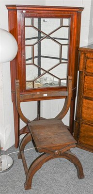 Lot 1160 - ~ A 19th century mahogany standing corner cupboard, astragal glazed and with satinwood banding,...