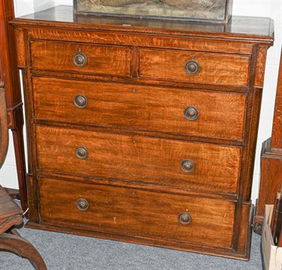 Lot 1161 - An Edwardian oak four height chest of drawers, lacking feet, 126cm by 58cm by 117cm