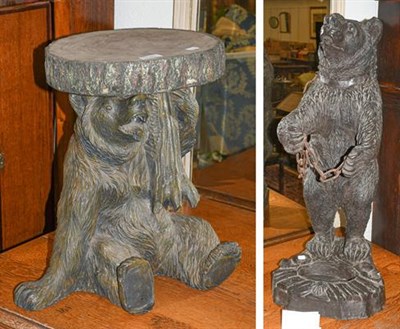 Lot 1180 - A Black Forest style bear umbrella stand in resin, together with a resin Black Forest seated...