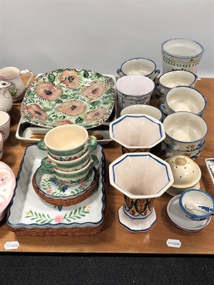 Lot 1183 - A collection of assorted Faience, including a French tea-service, various tin-glazed plates, an...
