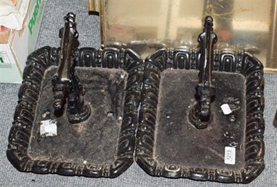 Lot 1213 - A pair of Victorian black painted cast iron boot scrapers (2)