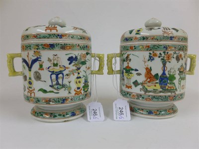 Lot 246 - A Pair of Samson Porcelain Twin-Handled Cylindrical Jars and Covers, in Kangxi style, with ball...