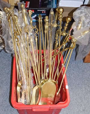 Lot 1226 - ~ A large quantity of brass fire tools