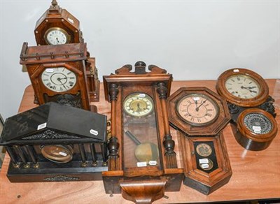 Lot 1264 - A Vienna type striking wall clock, two drop dial striking wall clocks, a Victorian striking...