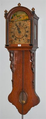 Lot 1265 - A Dutch oak cased drop dial wall clock, 130cm