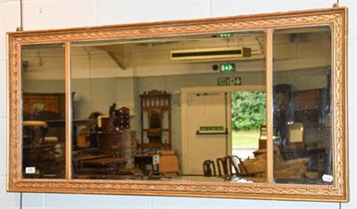 Lot 1268 - A 19th century sectional mirror of rectangular form within a gilt frame 130cm by 61cm