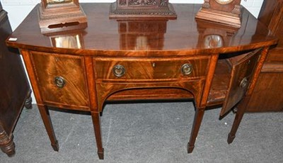 Lot 1269 - A George III inlaid mahogany bow fronted sideboard 150cm by 70cm by 92cm