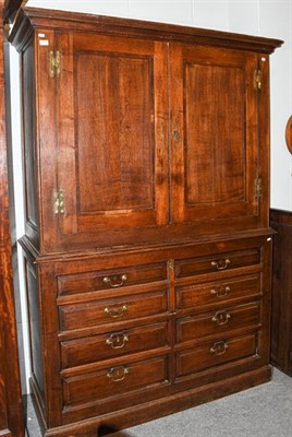 Lot 1282 - An 18th century oak press cupboard (alterations), 144cm by 55cm by 205cm