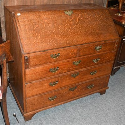 Lot 1291 - ~A Georgian Oak Bureau with fall front and fitted interior, 107cm by 53cm by 102cm