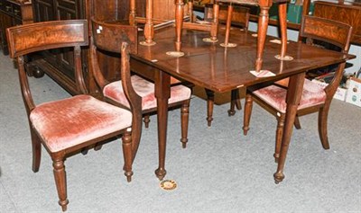 Lot 1292 - A 19th century mahogany drop leaf dining table (alterations) together with a set of four...