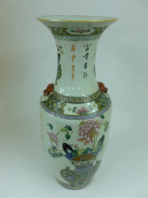 Lot 254 - A Chinese Porcelain Vase, 19th century, of ovoid shape with trumpet neck, decorated in famille rose