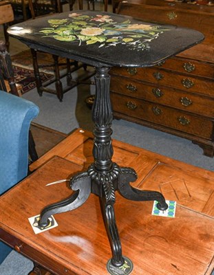 Lot 1312 - An early 19th century  carved ebony centre pedestal snap-top table with paper mache top,...