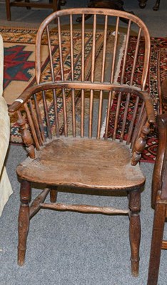 Lot 1332 - A 19th century ash and elm Windsor chair