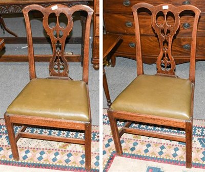 Lot 1337 - A pair of Georgian oak dining chairs with drop-in seats