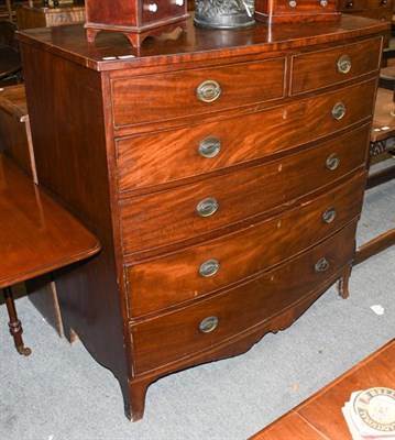 Lot 1345 - A George III bow-fronted mahogany chest of drawers, 117cm by 57cm by 121cm