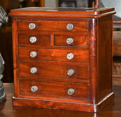 Lot 1346 - A Victorian mahogany miniature five-height chest of drawers, with glass pulls, 32cm by 20cm by 32cm
