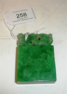 Lot 258 - A Chinese Jadeite Seal, Qing Dynasty, of slender vertical square form with kylin handle, the matrix