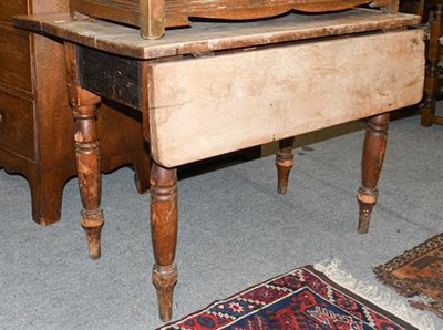 Lot 1354 - A Victorian pine drop-leaf kitchen table, 103cm (open) by 107cm by 75cm