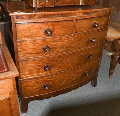 Lot 1356 - A George III inlaid mahogany bow fronted four-height chest of drawers, 106cm by 53cm by 110cm