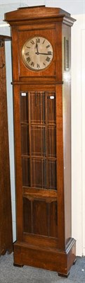 Lot 1374 - An Art Deco mahogany striking longcase clock
