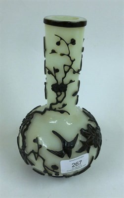 Lot 267 - A Peking Black and White Overlay Glass Vase, 19th century, carved with birds amongst flowering...