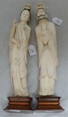 Lot 276 - A Pair of Chinese Ivory Figures of a Man and Woman, 20th century, each with beaded headdress...