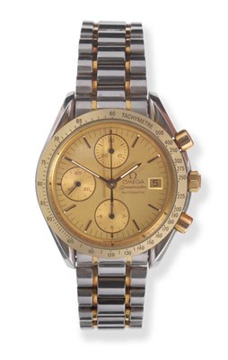Lot 524 - A Bi-Metal Automatic Calendar Chronograph Wristwatch, signed Omega, model: Speedmaster, circa 1995