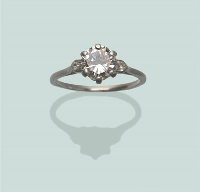 Lot 670 - A Diamond Solitaire Ring, the round brilliant cut diamond in a white six claw setting, a...