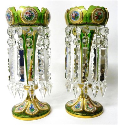 Lot 3 - A Pair of Bohemian White Overlay Green Glass Lustres, circa 1870, the squat globular bowls with...