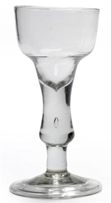 Lot 4 - A Goblet, circa 1710, the ogee bowl on a heavy drop knop with air tear on a short cylindrical...