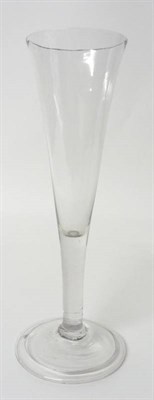 Lot 7 - An Ale Glass, circa 1740, the drawn trumpet bowl on plain stem and folded foot, 21cm high
