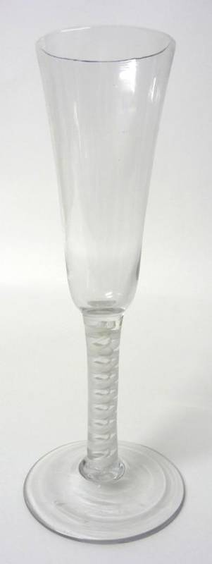 Lot 20 - An Ale Glass, circa 1760, the slender rounded funnel bowl on a double series opaque twist stem,...
